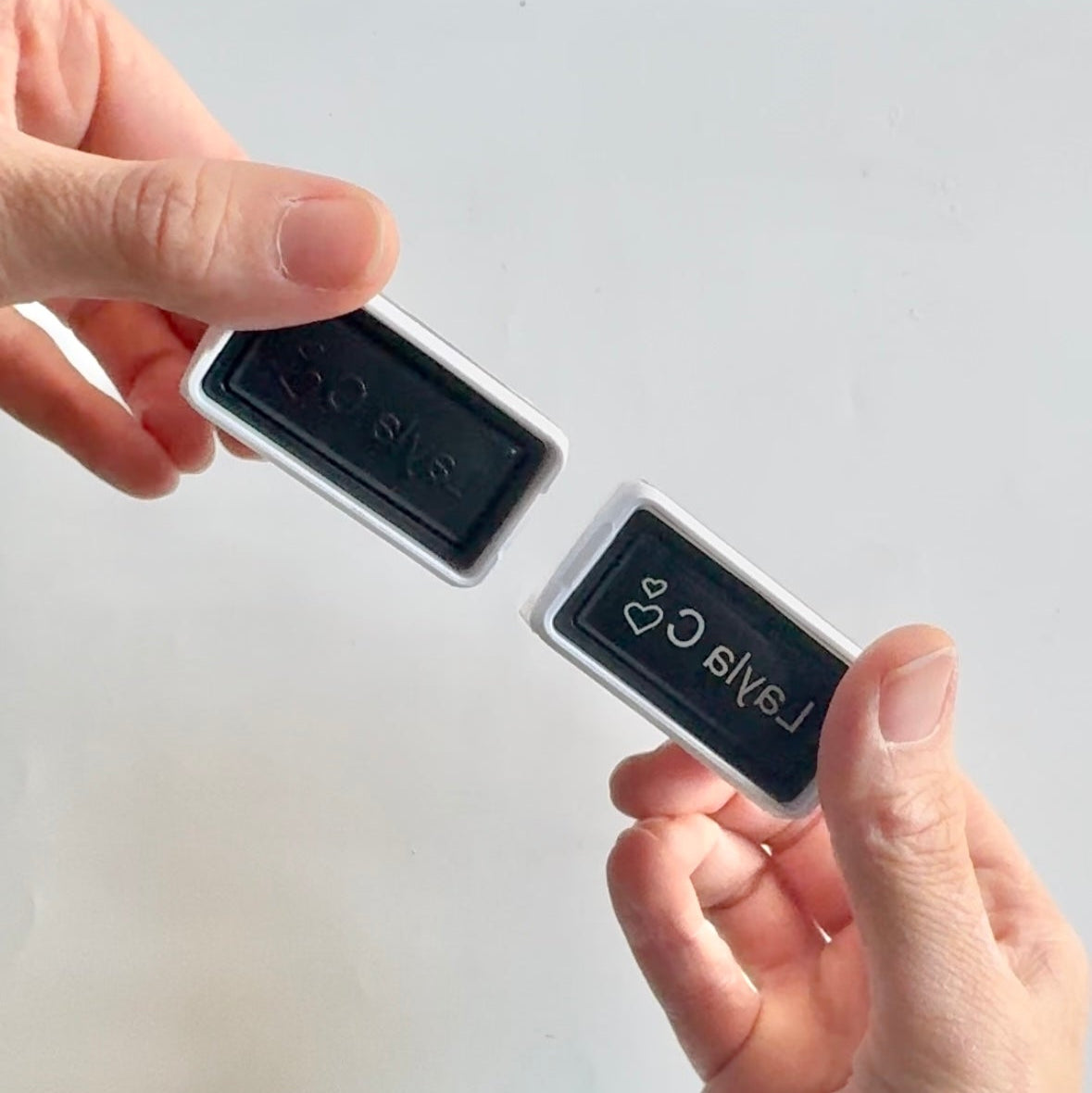 The underside of two StampHIT Name Stamps