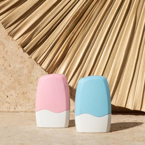 Pink and blue privacy stamps standing upright next to each other