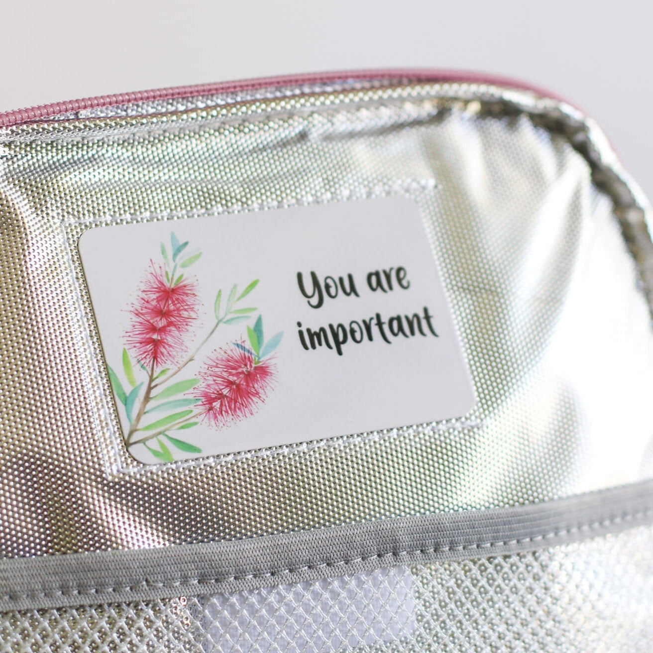 A affirmation card on the side of a bag saying You Are Important