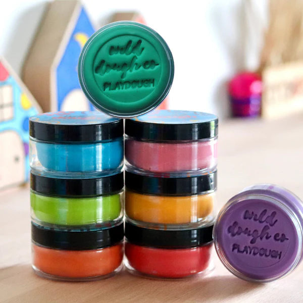 Multi coloured play dough in small containers