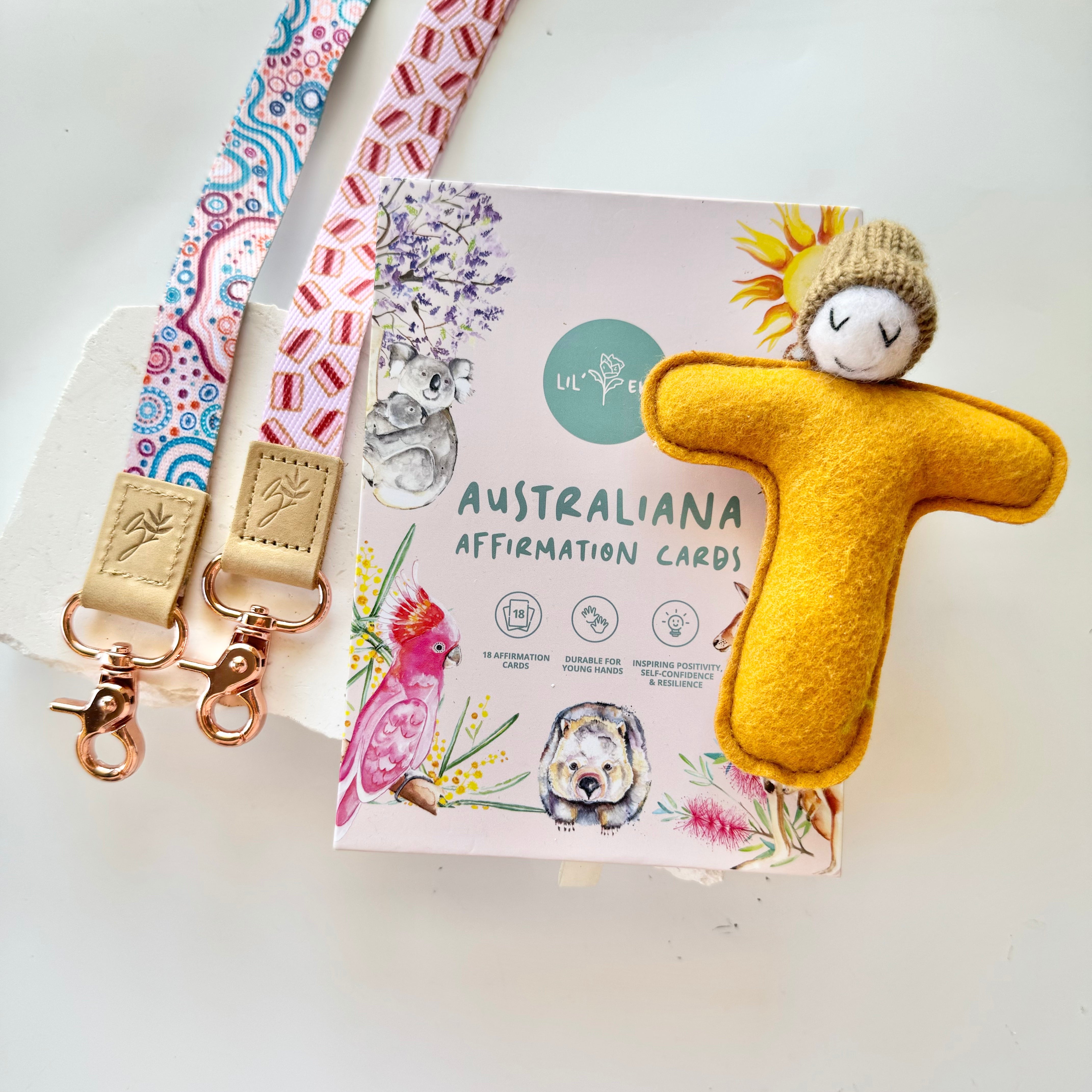 A box of affirmation cards with a soft toy