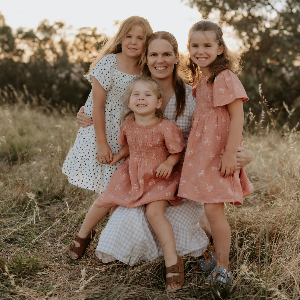 An image of Marlee and her daughters at the farm.
