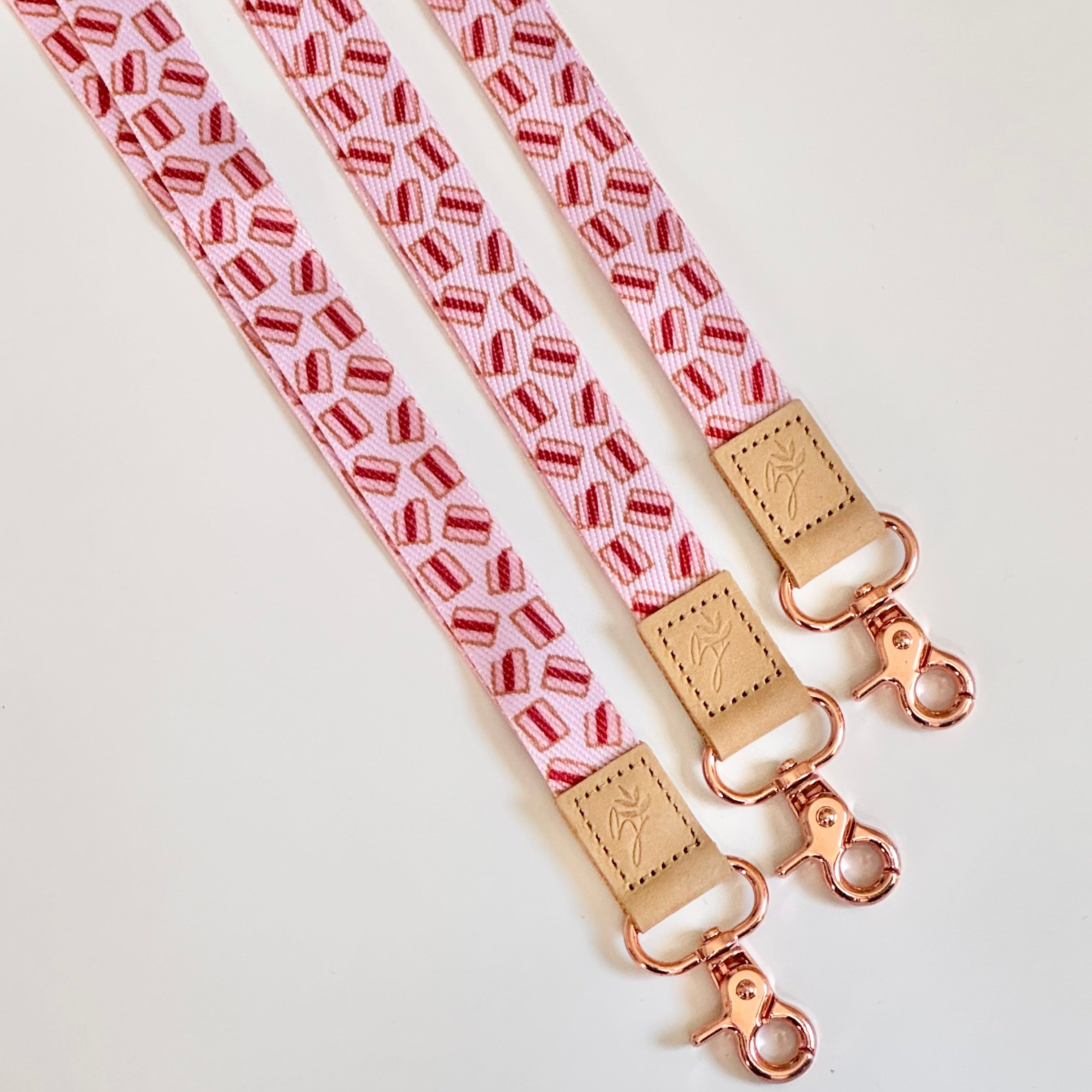 Three vovo biscuit fabric lanyards